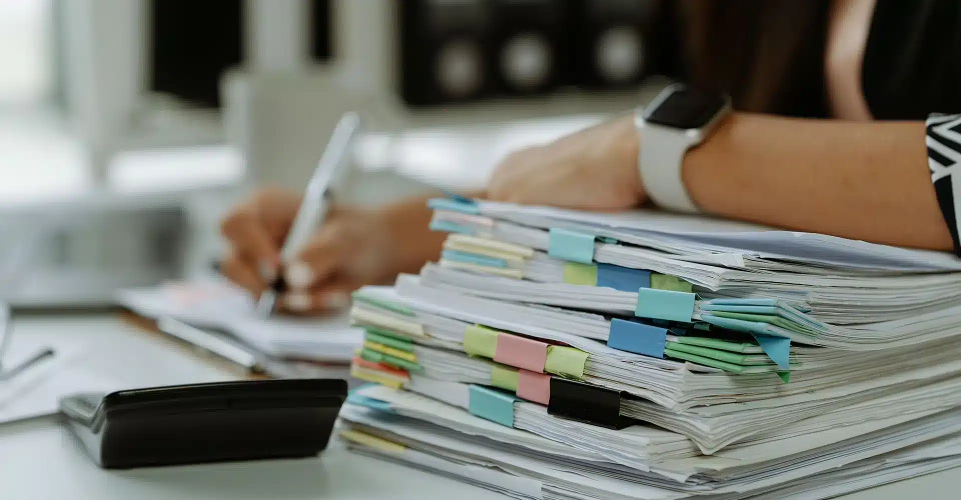 Cost of Trademark registration in the UK application showing UK brand owner reviewing legal documents