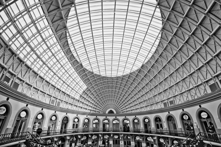 The MAR Legal Blog 6 Explore the architectural marvel of the Leeds Corn Exchange, captured in a dramatic black and white photo.