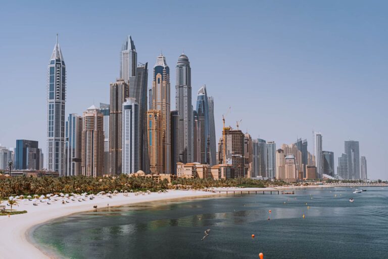 Dubai business district skyline representing the DIFC employment visa process for UK businesses